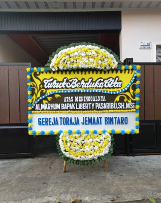 Papan Bunga Duka di Kaliawi Persada